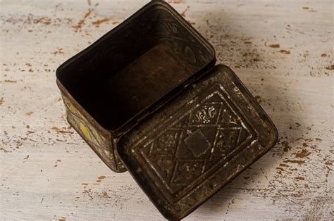 antique metal box hand with holes|antique metal box with hinged lid.